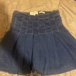 Blue denim skirt with zipper on side
